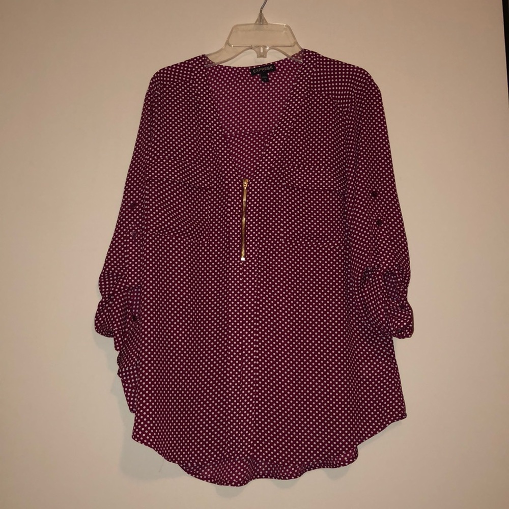 Red blouse with white polka dots